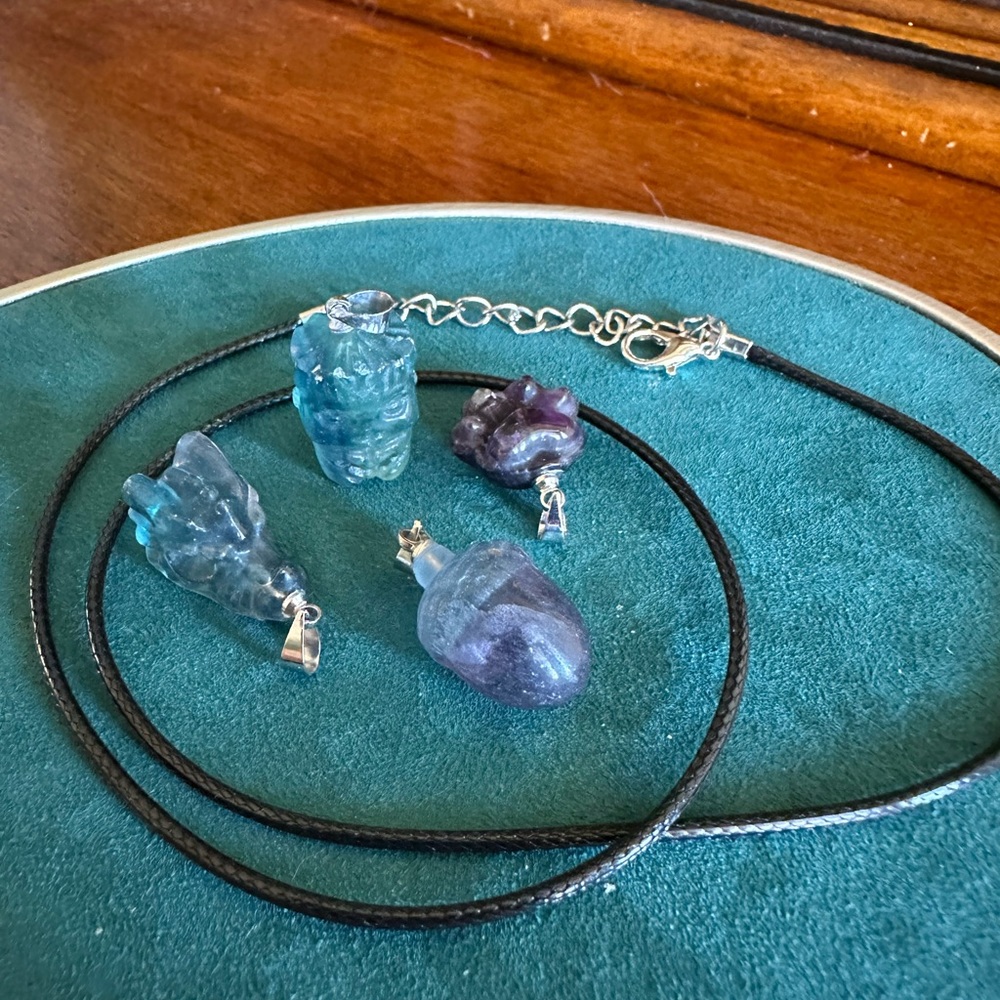 Set of 4 pendants with cord. Groot, Dragon head, acorn, and Paw.  Fluorite